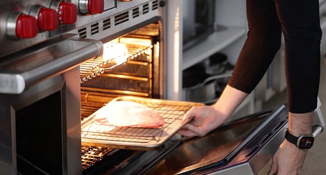 adding a picanha to the oven
