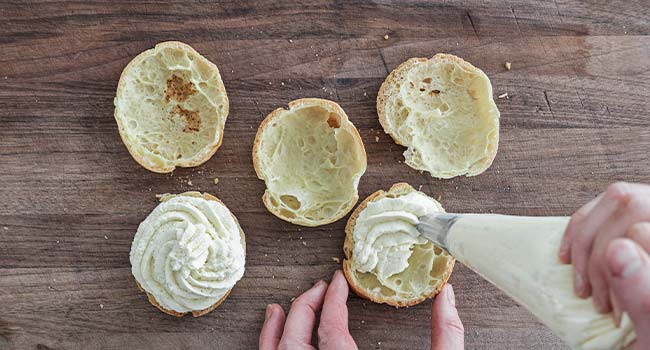 adding bavarian cream to cream puffs