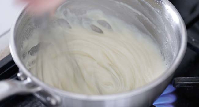 whisking a thickened milk