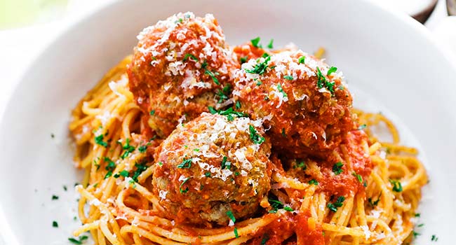 meatballs in sauce on spaghetti