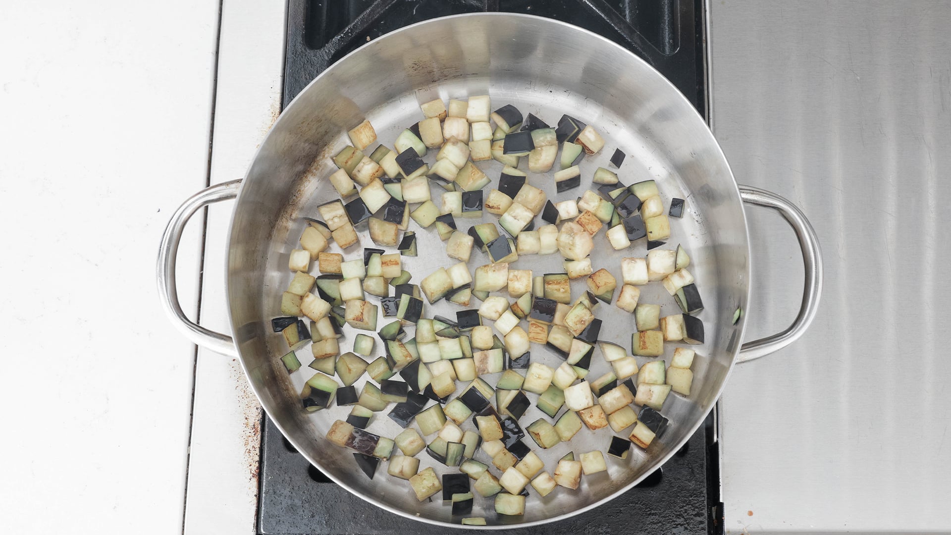 searing diced eggplant