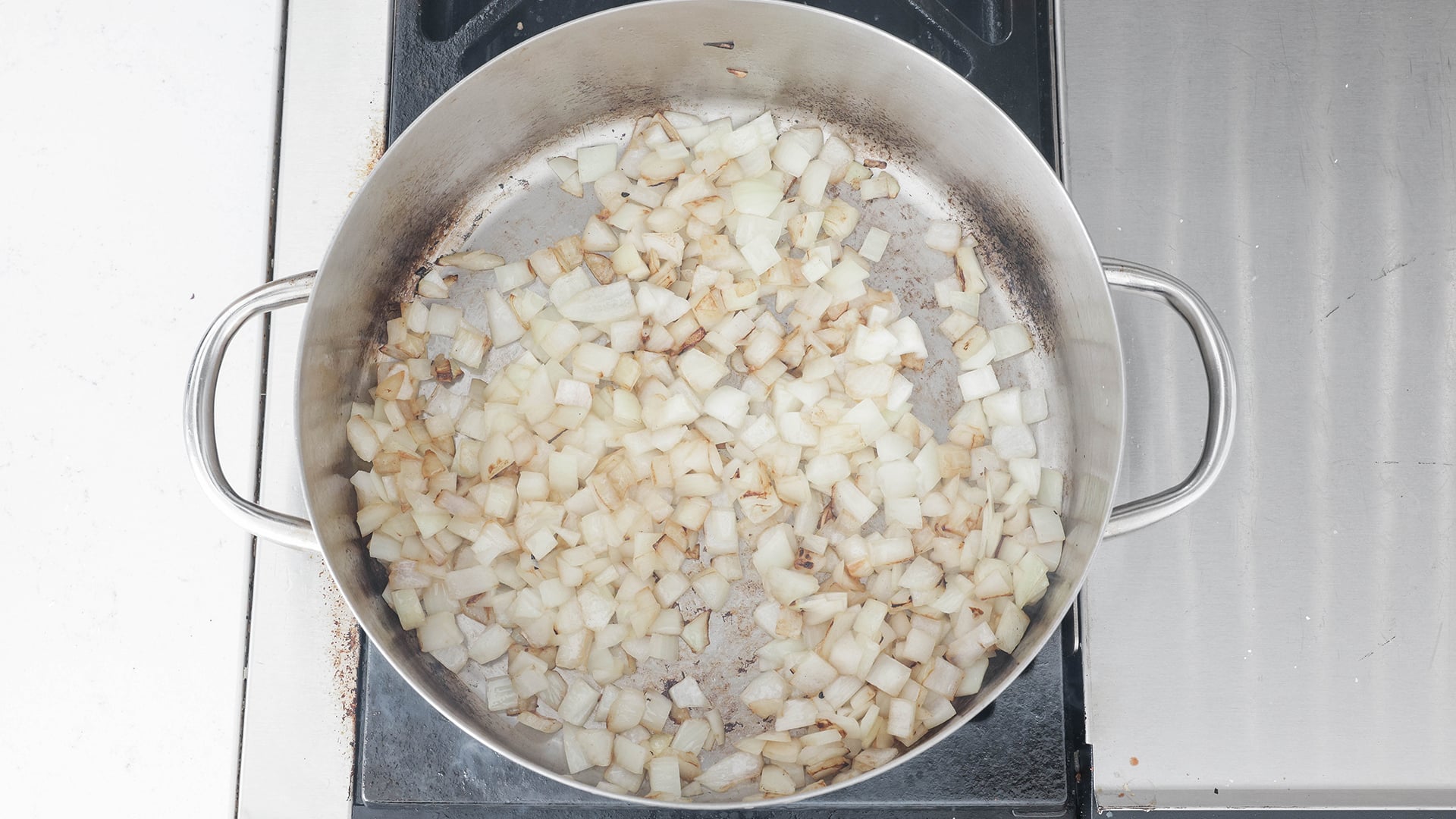 browning onions in a pot