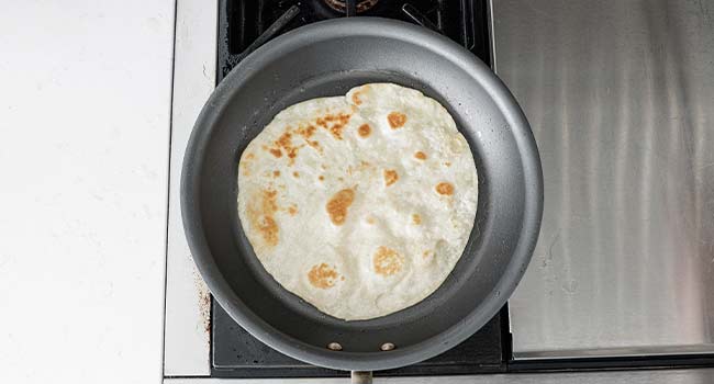 frying a tortilla shell