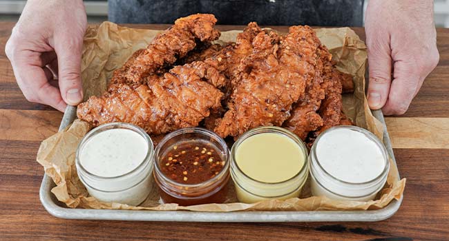 hot honey chicken tenders with sauces