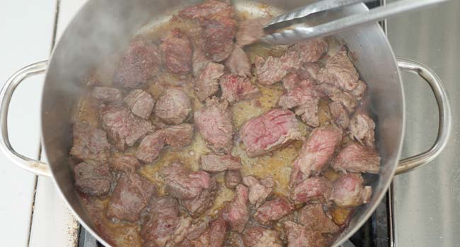 seared meat in a pot