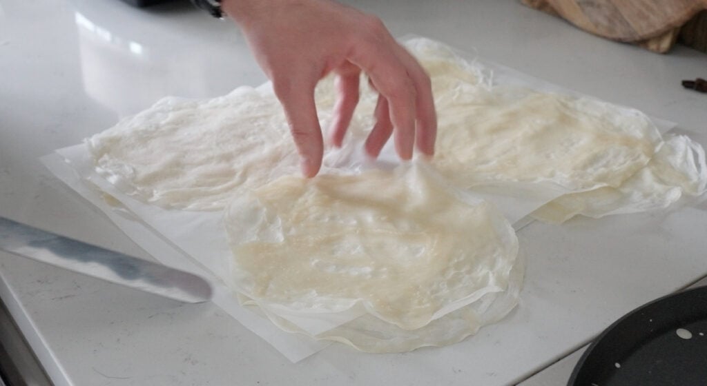 finished lumpia wrappers on parchment paper