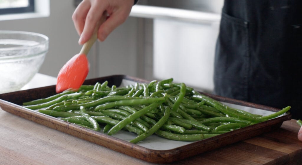 Green Beans spread out on sheet tray
