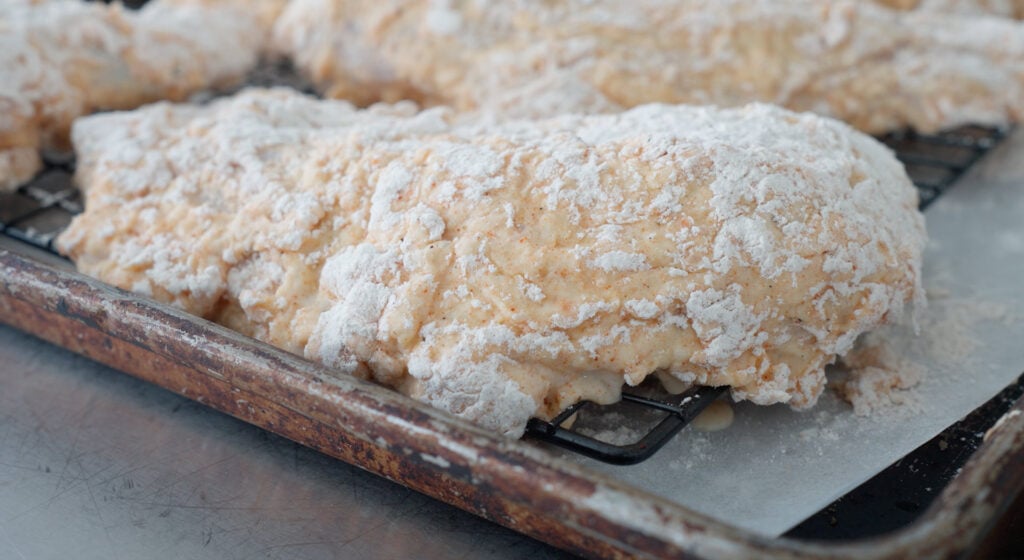 chicken resting on a tray