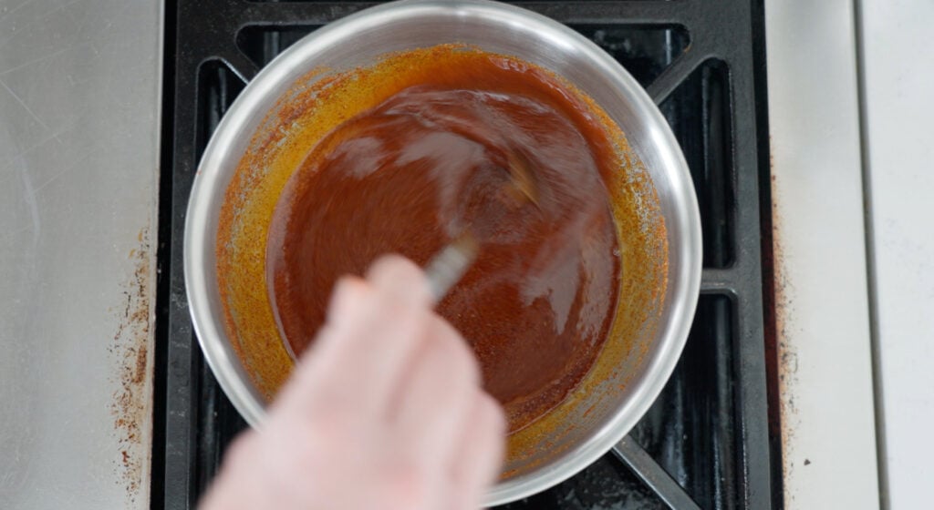 sauce cooking in small saucepan