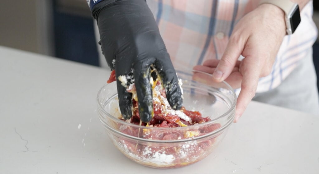 add marinating ingredients to the bowl with the beef