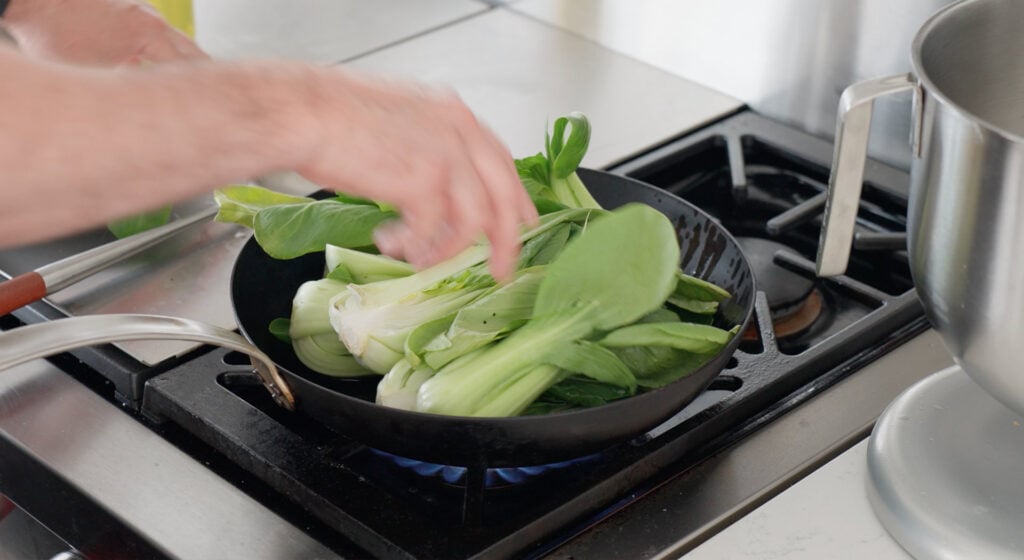 Adding Bok Choy to hot pan