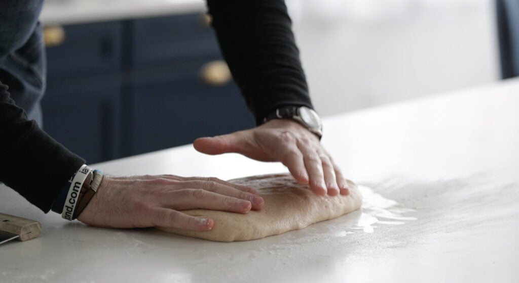 flatten the dough into a rough rectangle.