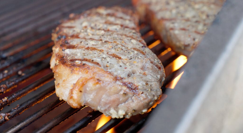 steaks. on a hot grill