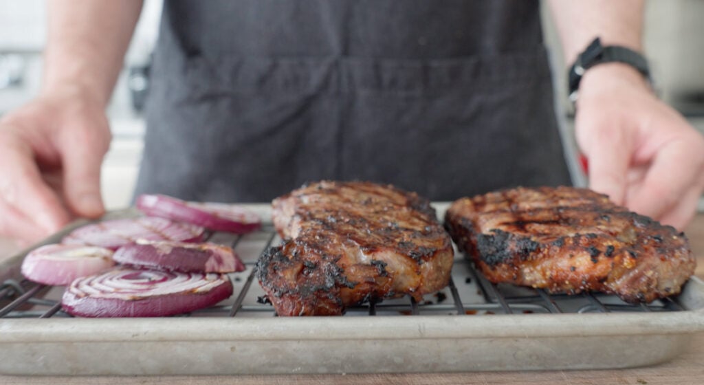 steaks resting on a plate