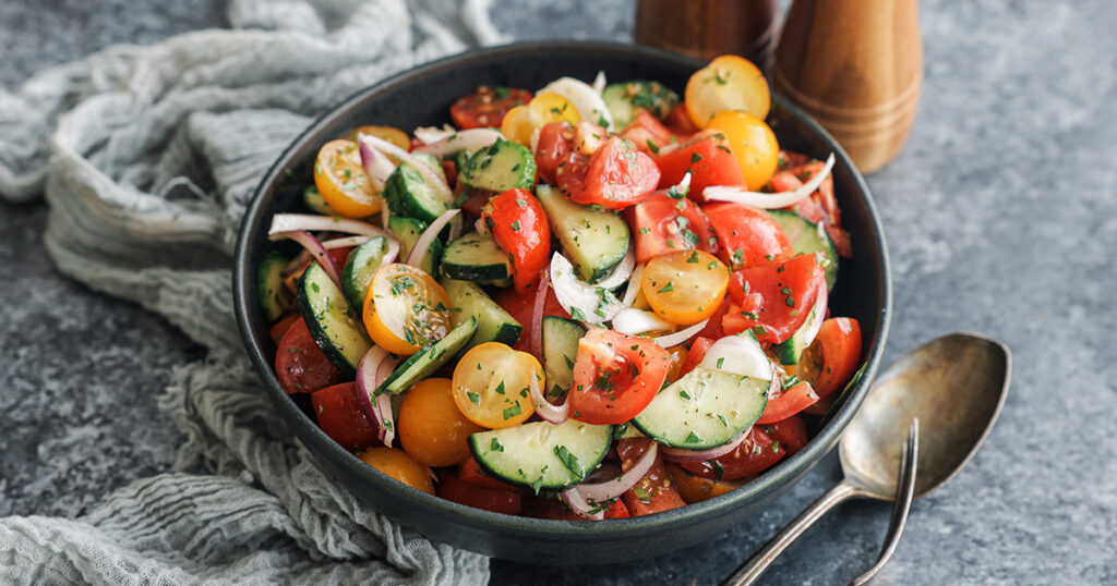finished tomato and cucumber salad in a bowl