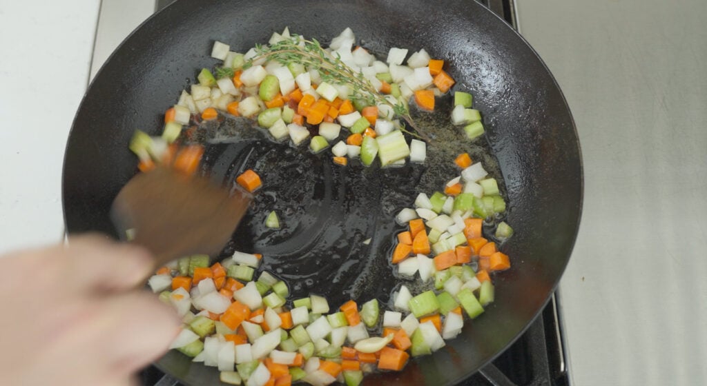 vegetables sauteeing in pan
