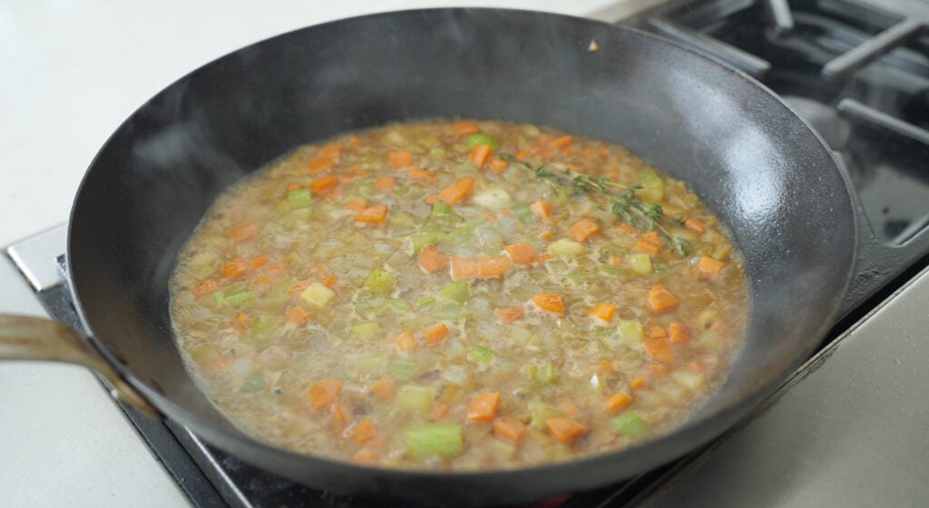 pan deglazing on stove