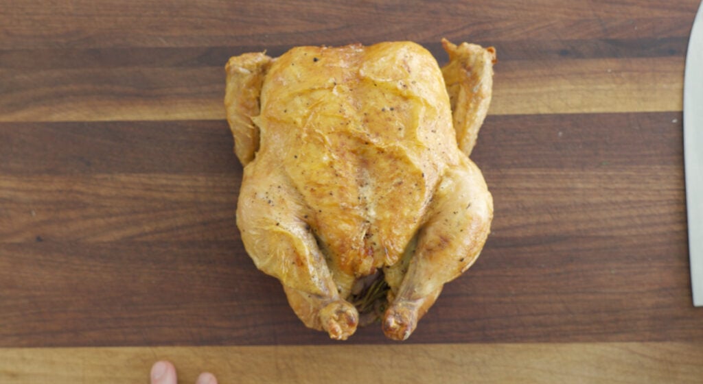 Roasted Chicken rested on a cutting board