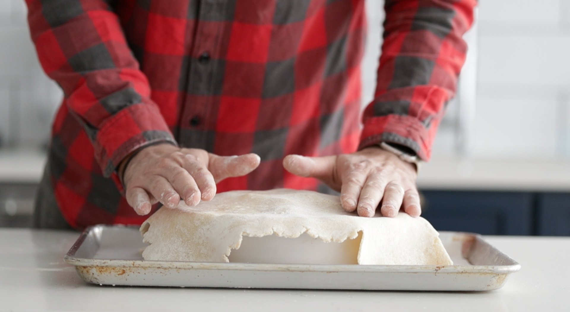 adding the top part of the an apple pie
