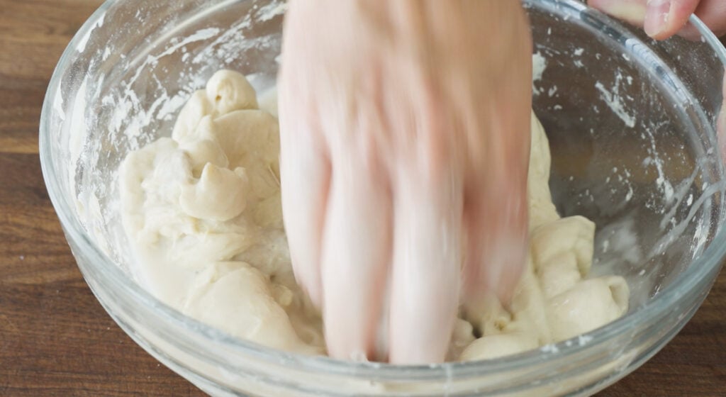 mixing dough ingredients by hand