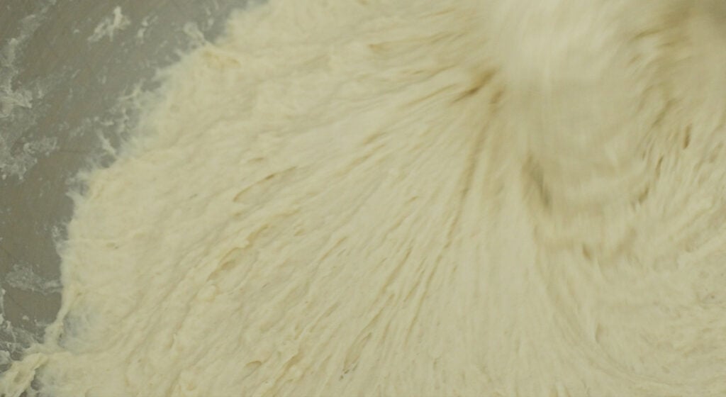 flour and water being mixed