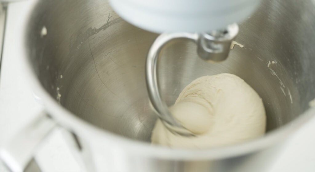 dough on a hook in a stand mixer