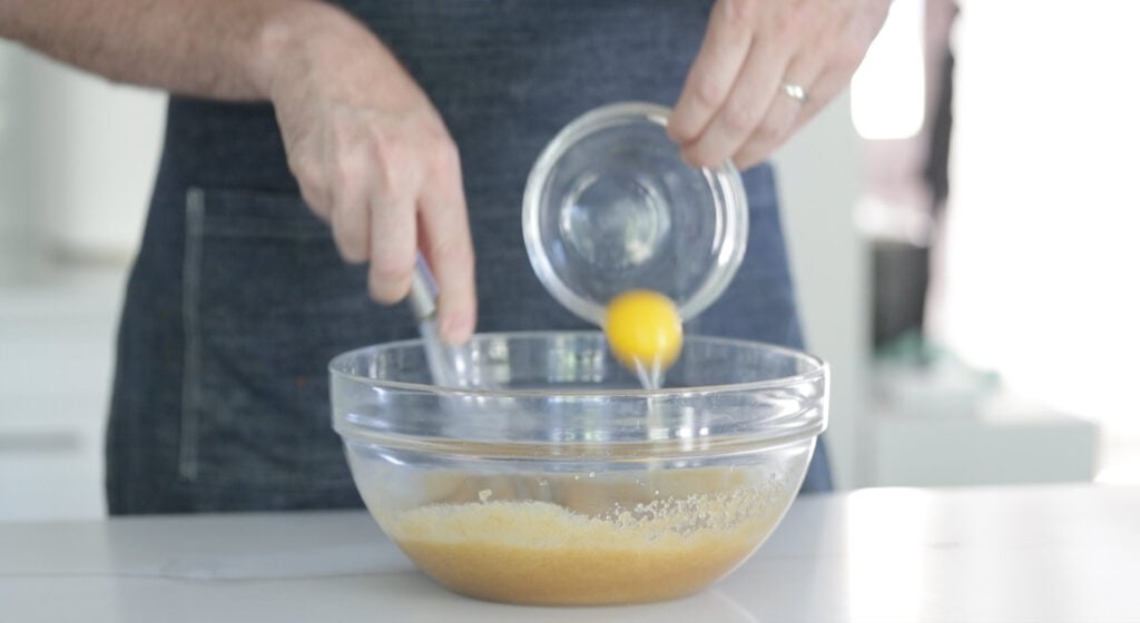 whisking together eggs and sugar