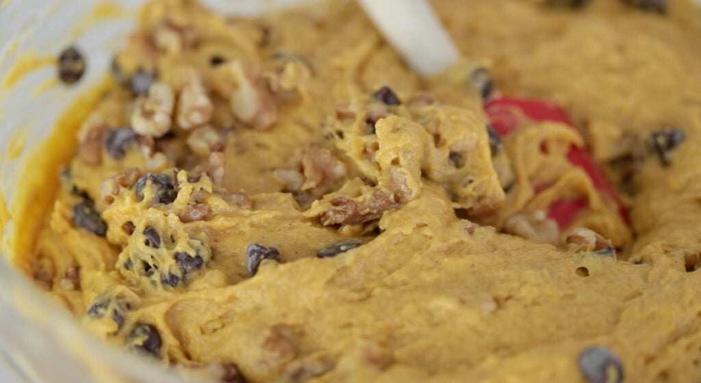 whisking dry ingredients with wet ingredients