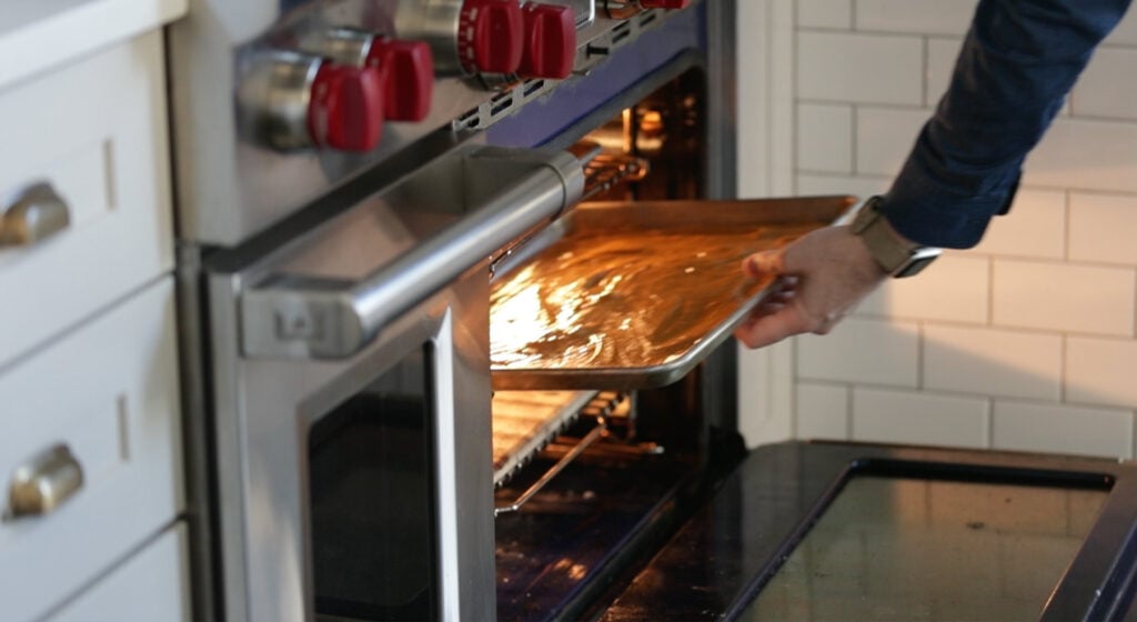 putting the cake in the oven