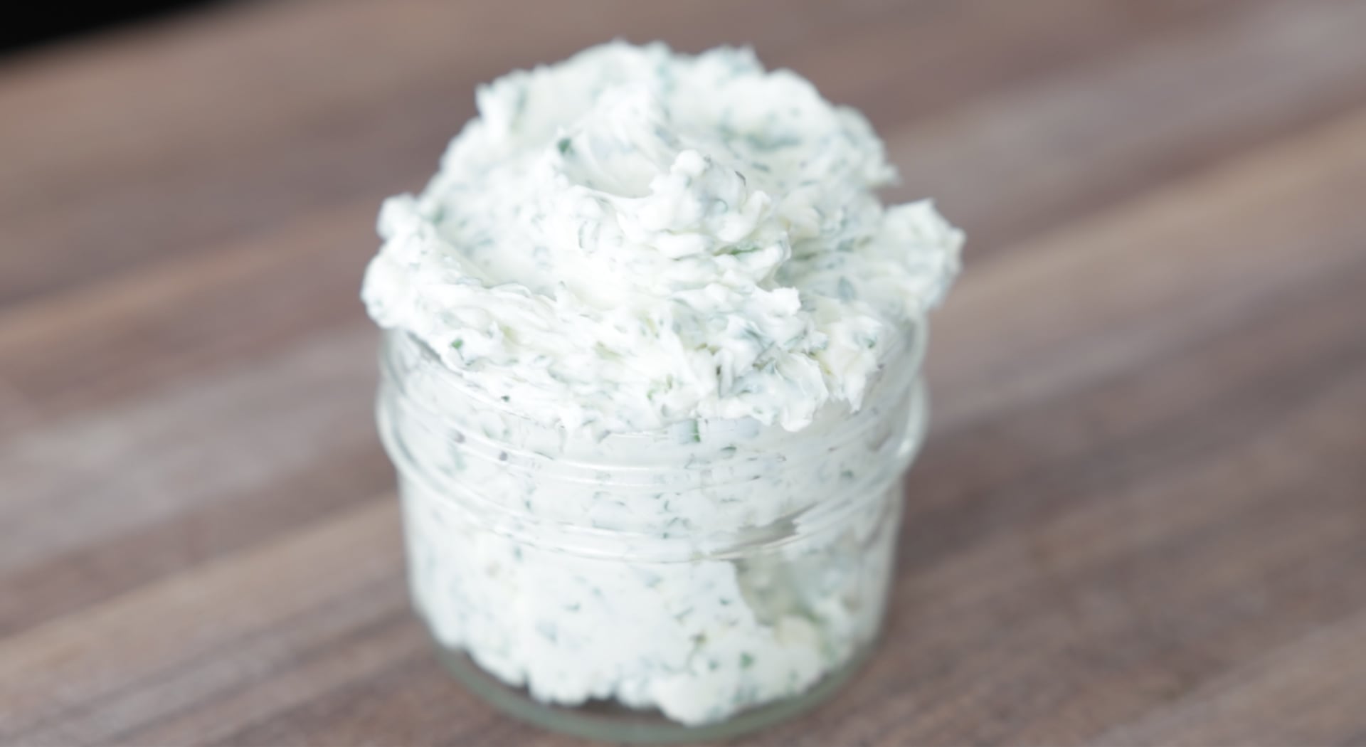 garlic butter with herbs in a jar