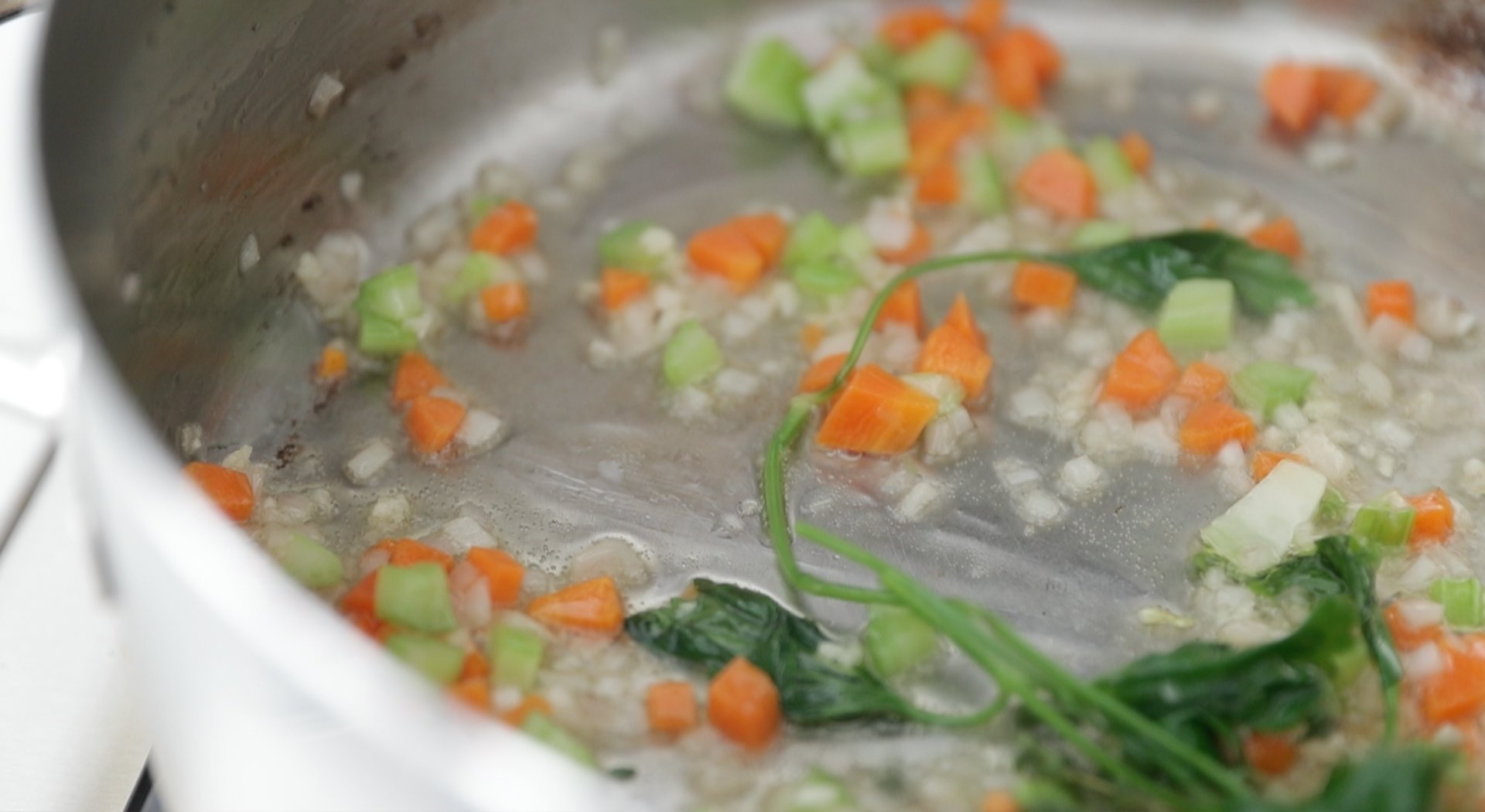 cooking vegetables and herbs in fat