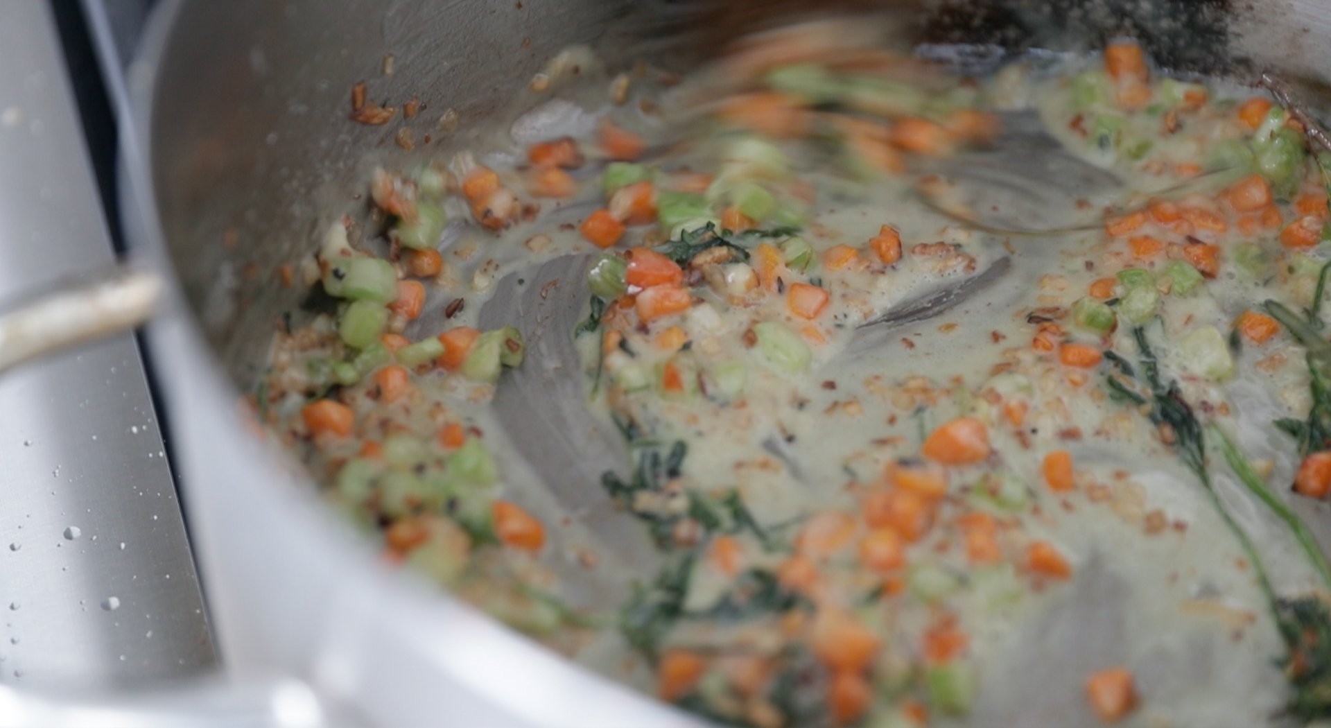 making a roux with flour and cooked vegetables