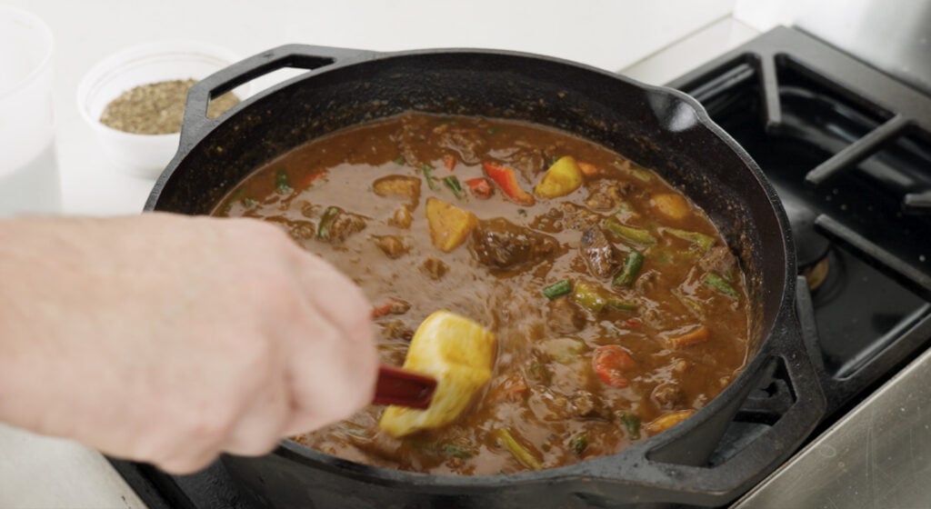 stiring the beef kaldereta
