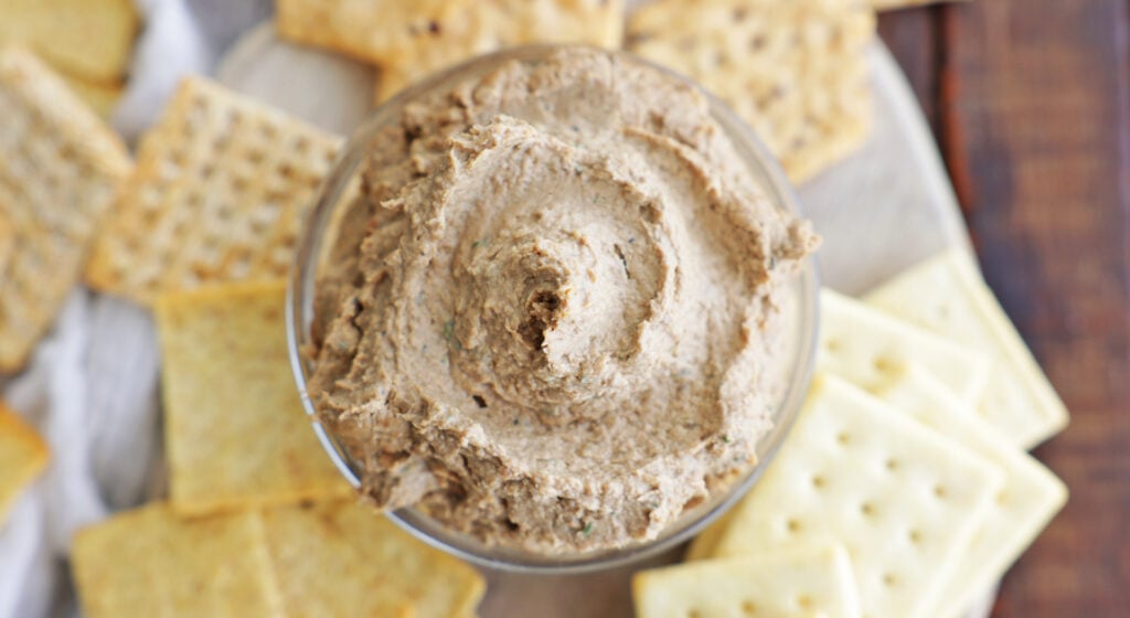 Beef liver spread in a bowl with crackers