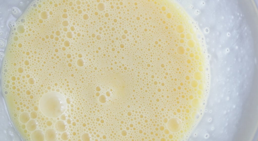 whisking eggs in a bowl