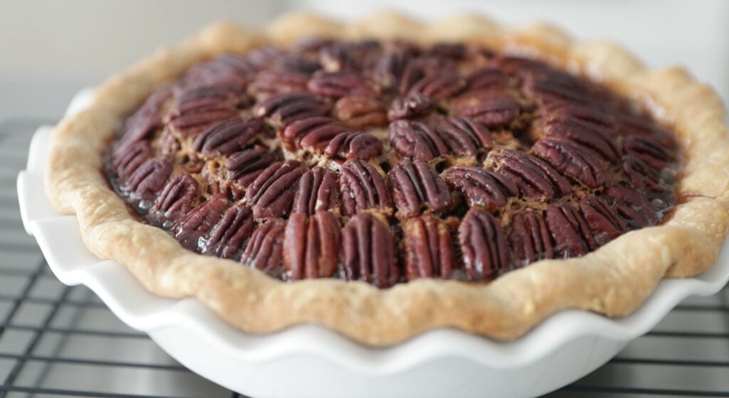 baked pecan pie on a rack