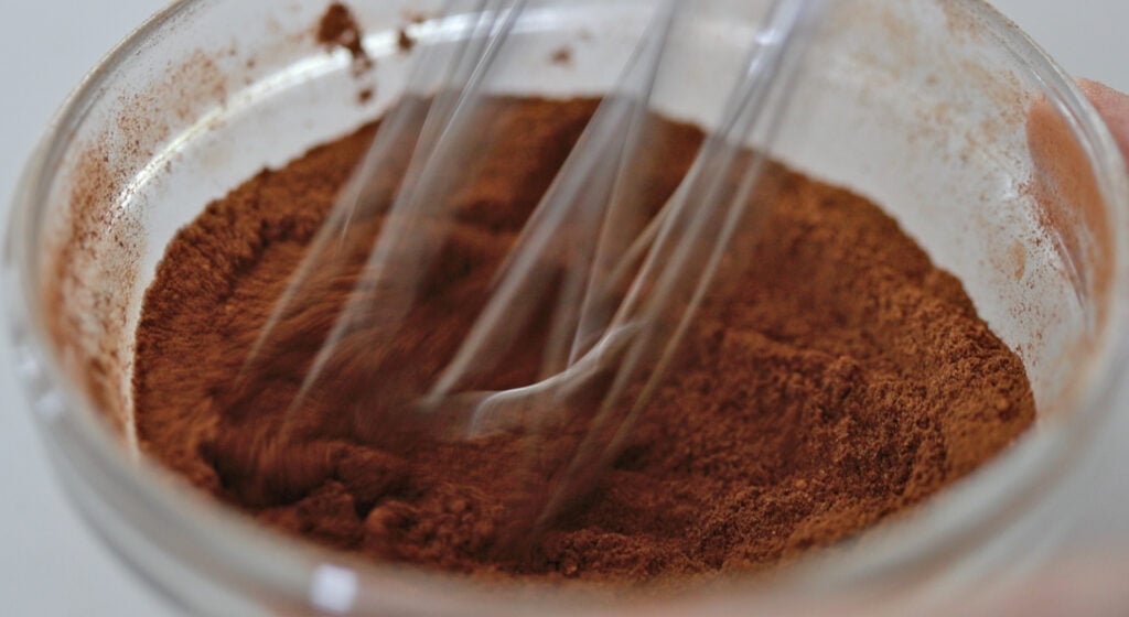 whisking together a pumpkin pie spice blend