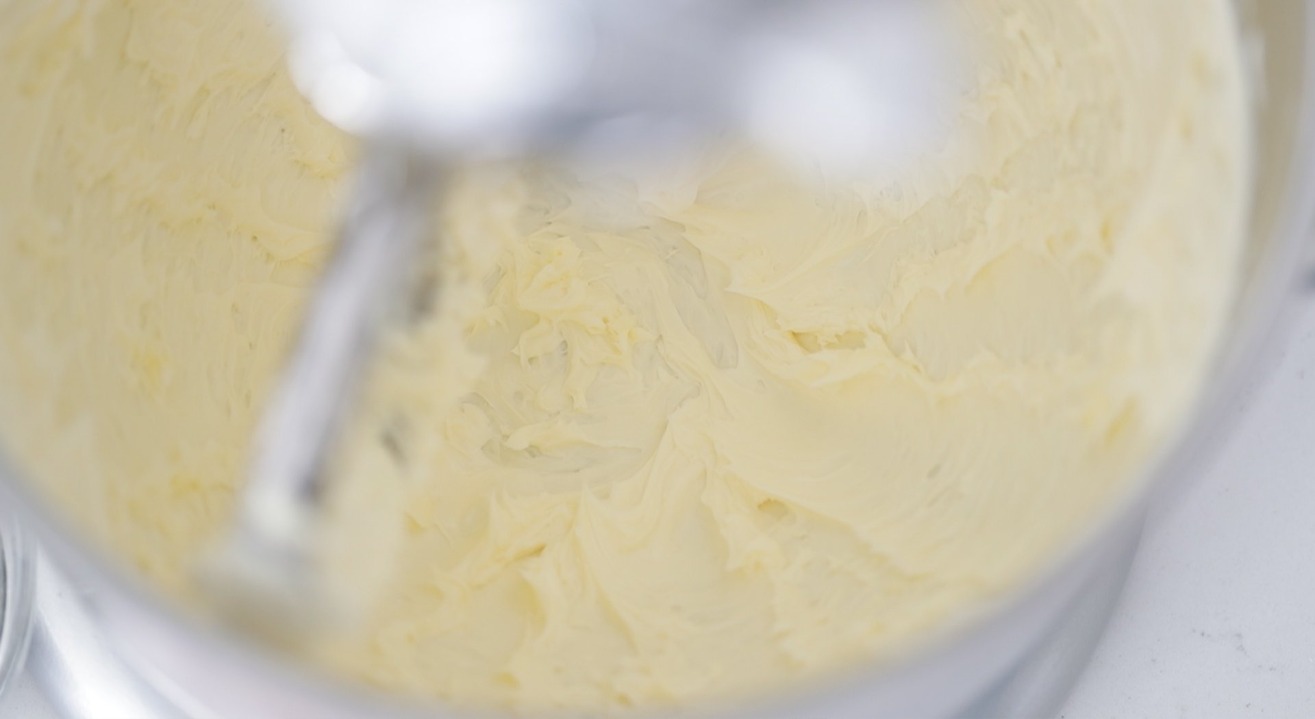 adding butter to a stand mixer
