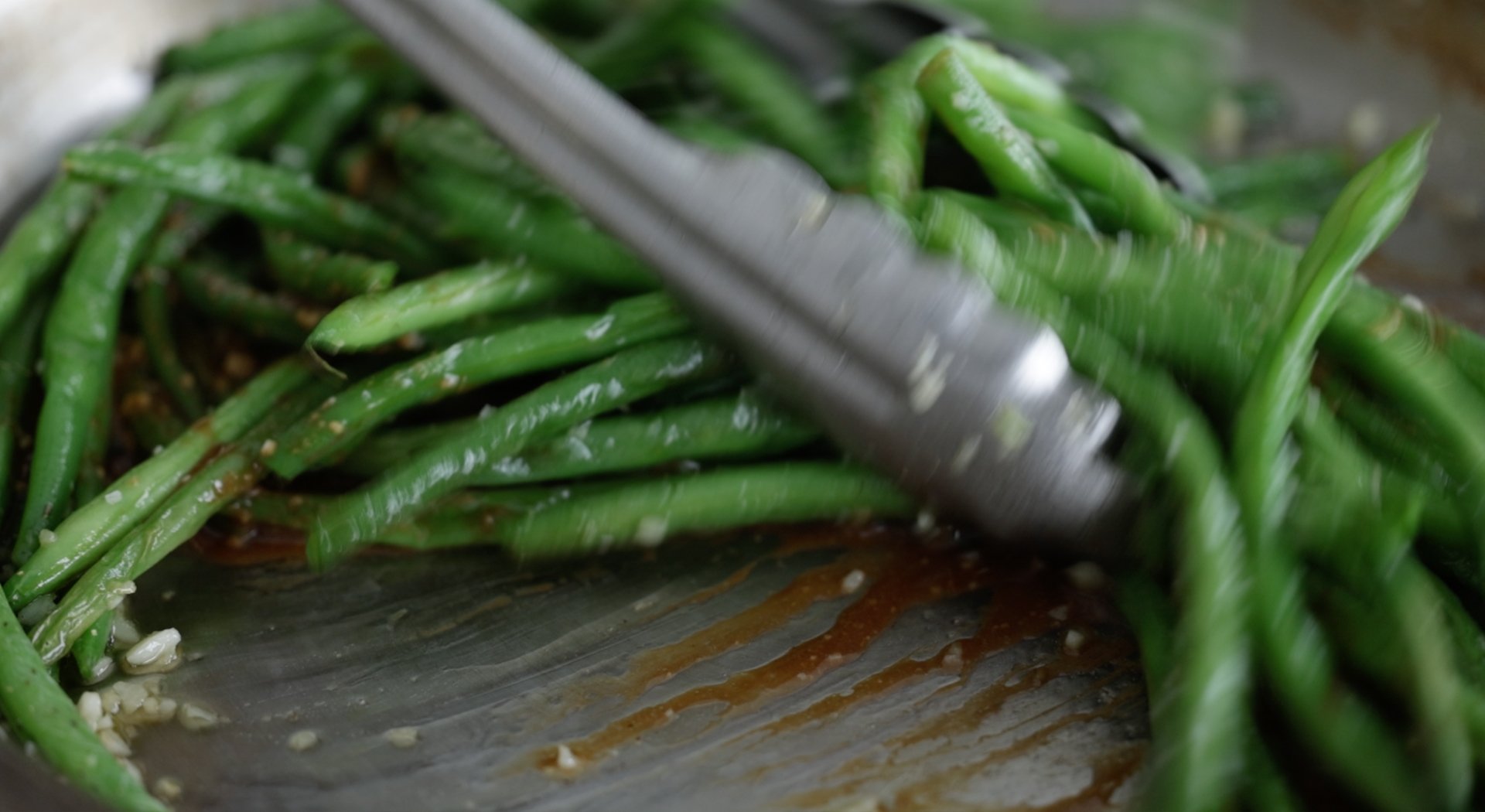 mixing beans with soy sauce