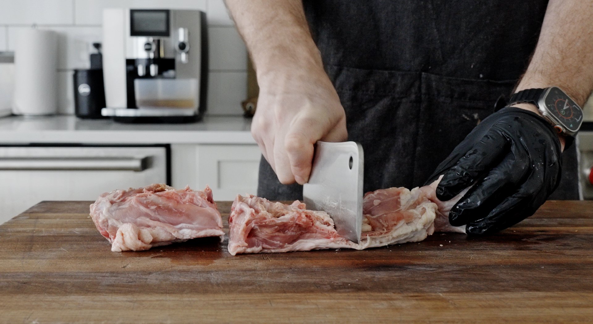 chopping a turkey backbone