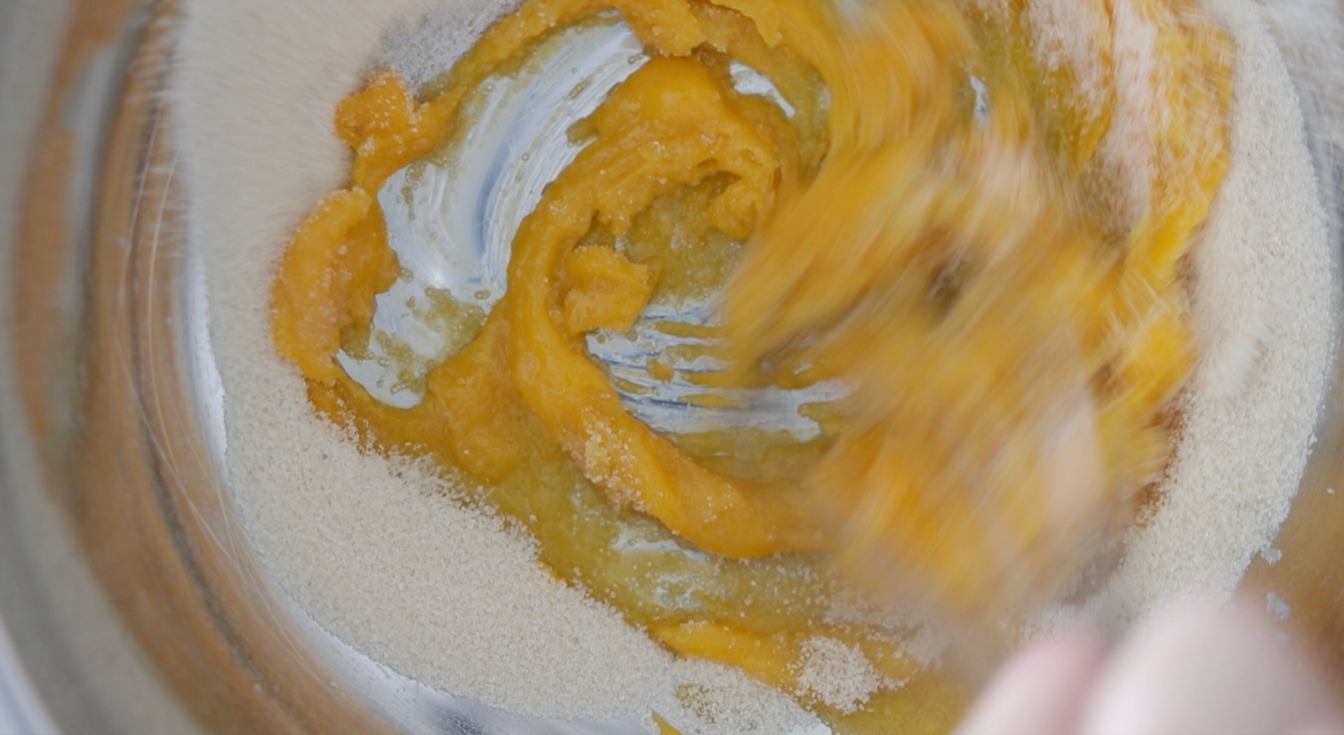 whisking eggs and sugar