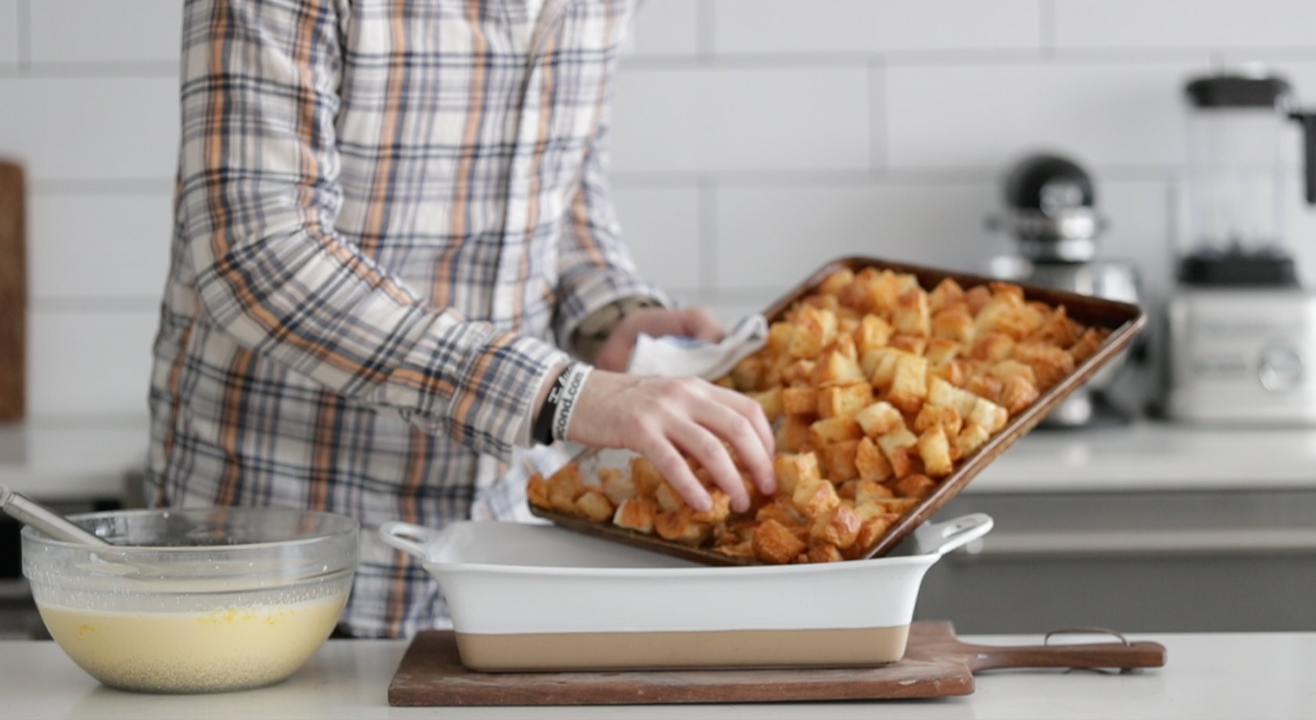 adding crust croissants to a casserole dish