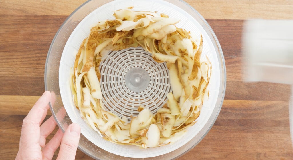Potato skins in a salad spinner