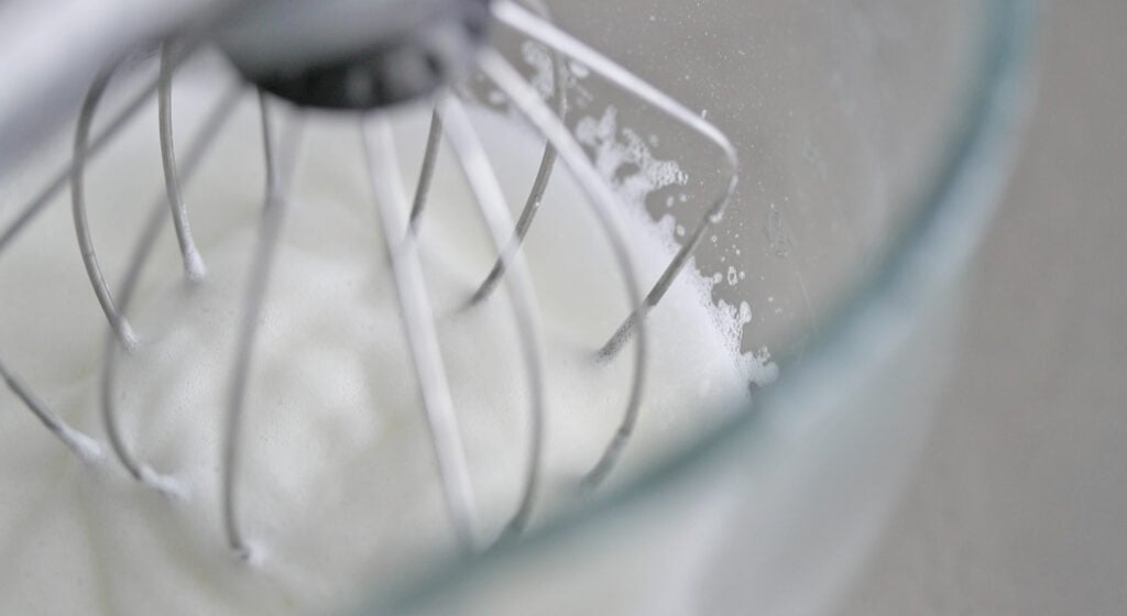 egg whites and cream of tartar to the bowl