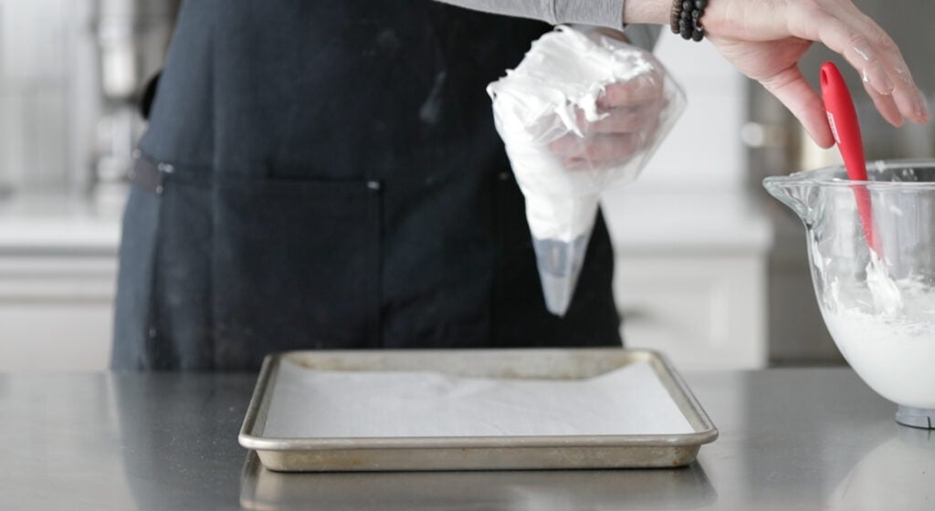 Transfer the meringue to a piping bag