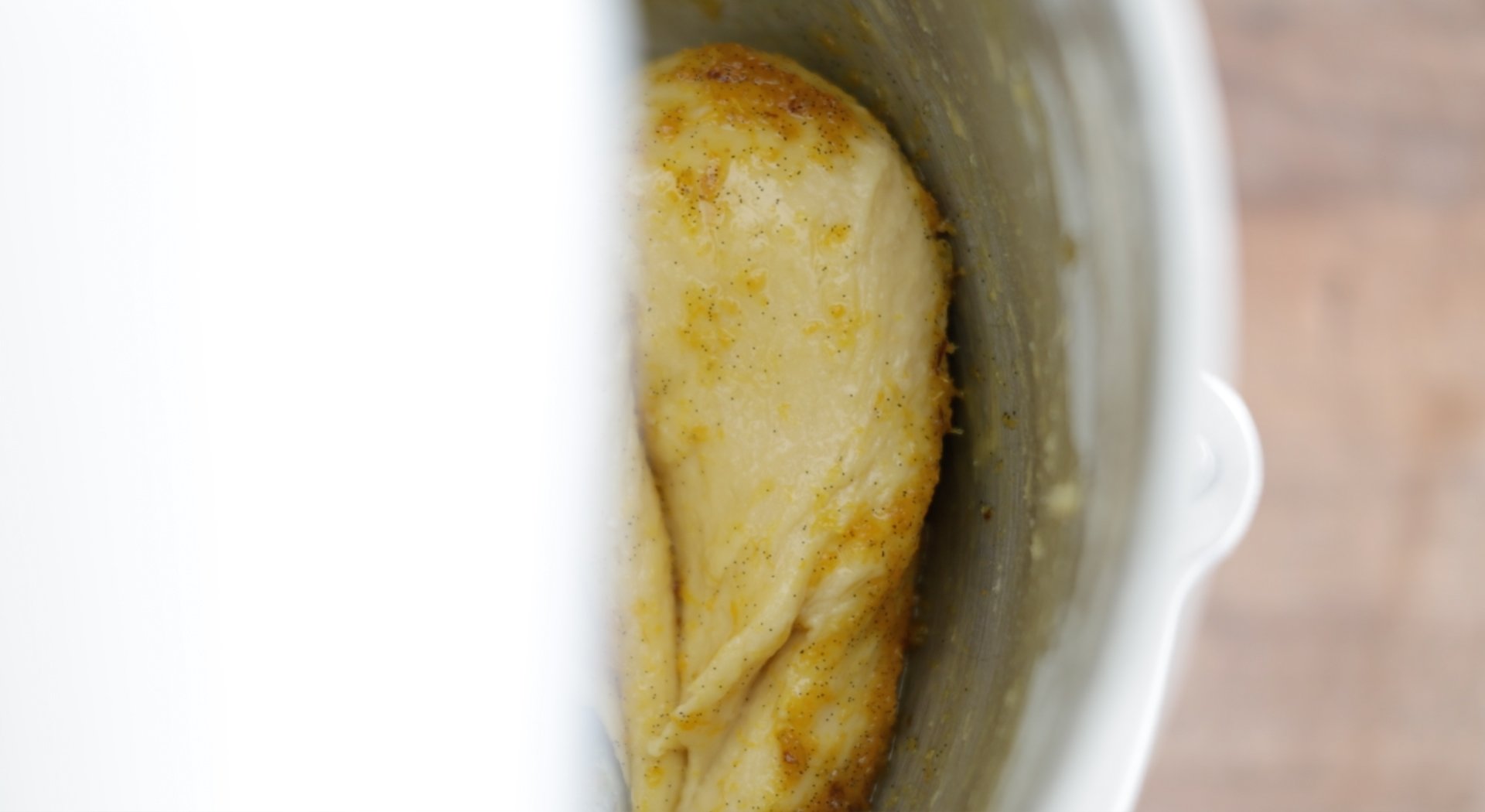 adding honey to dough