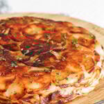 Pommes anna on a wooden board