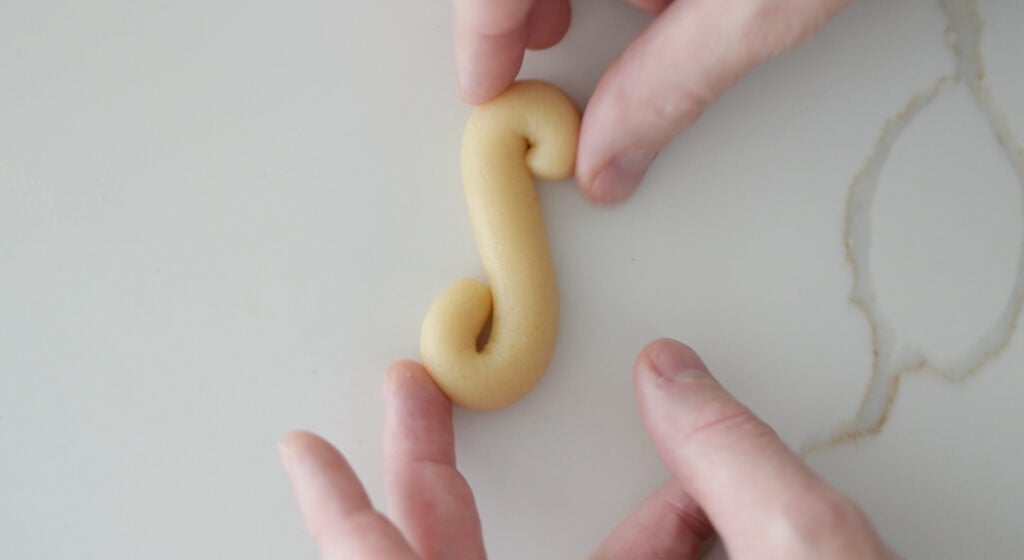 raw s shaped cookie dough