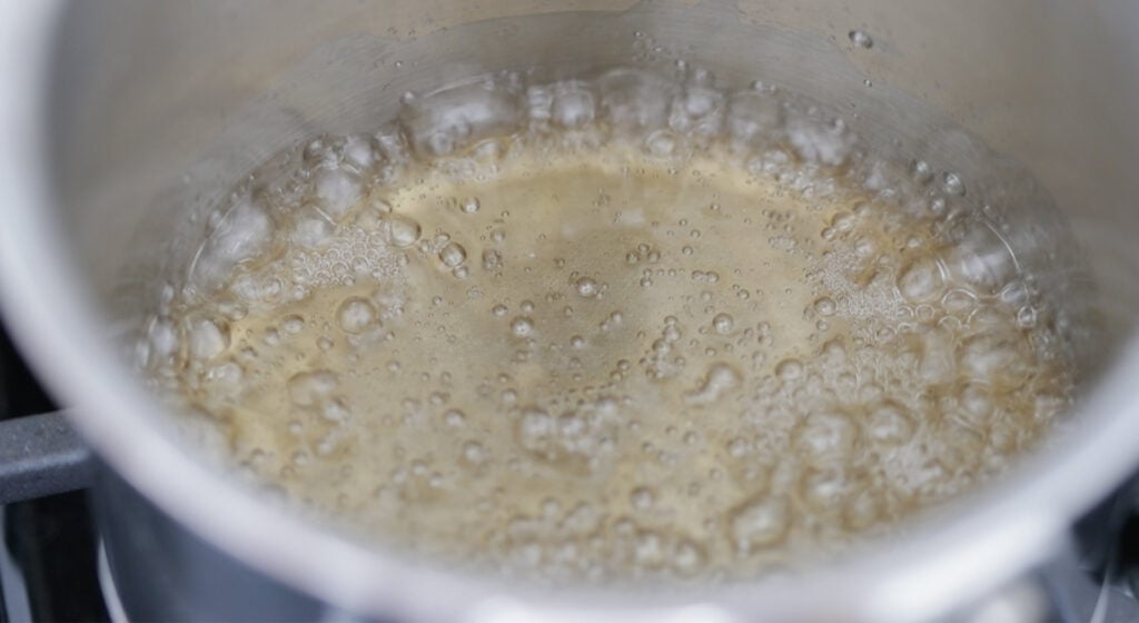 water and sugar to a small-size pot