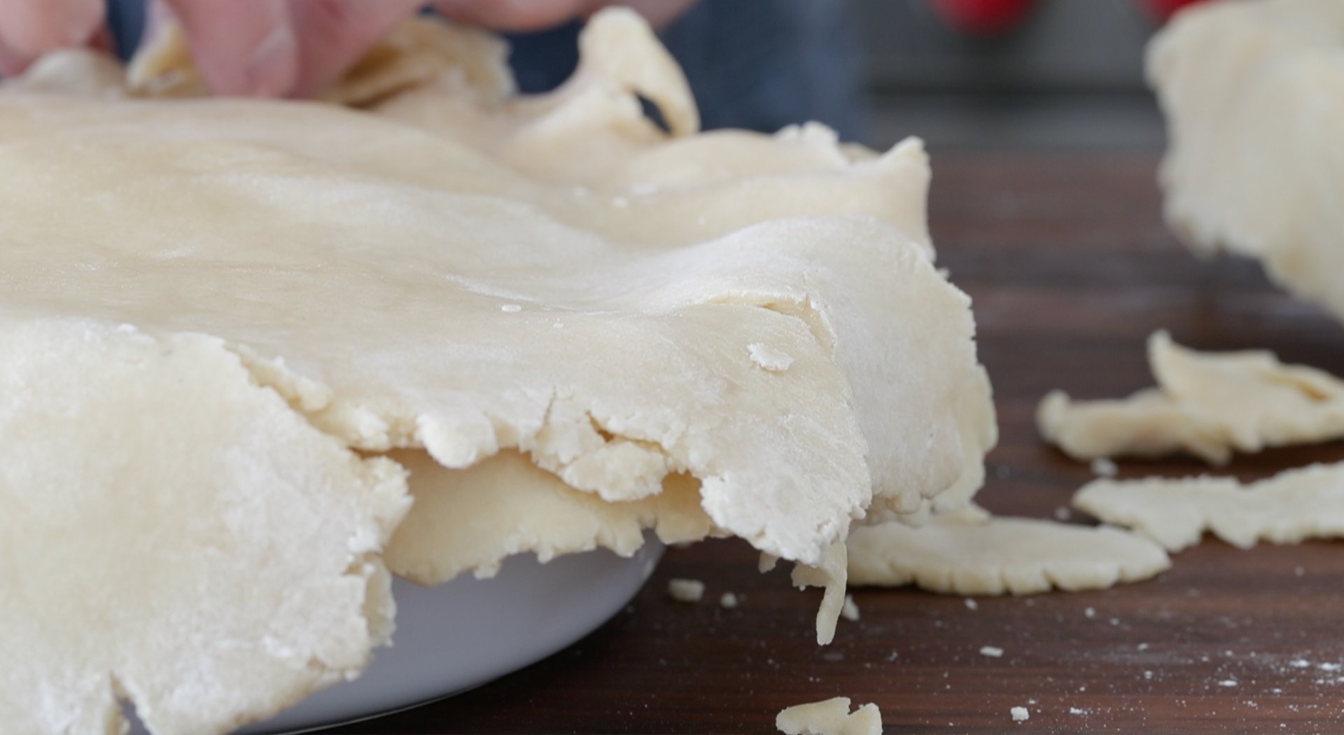 covering a pot pie with dough